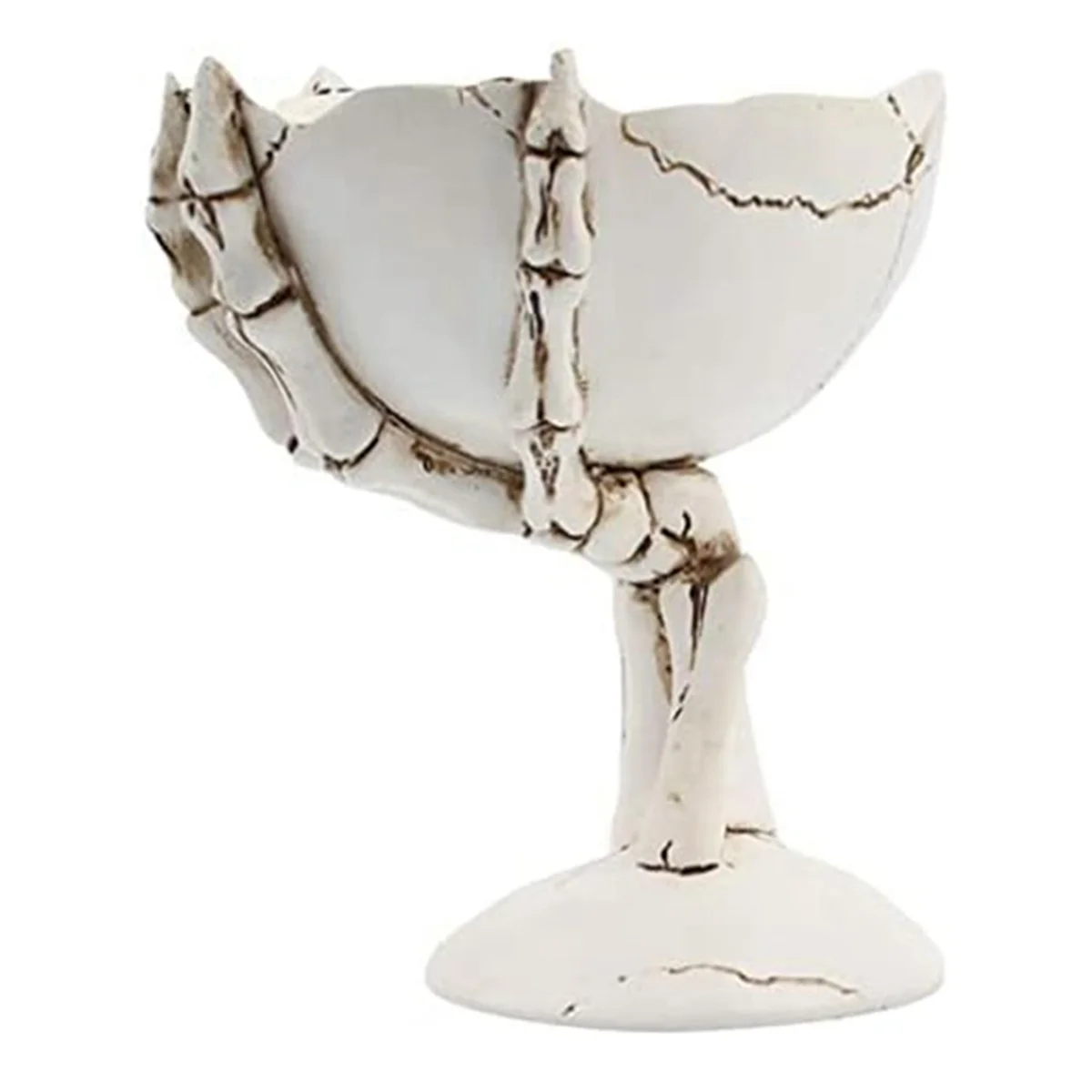 Decorative item resembling a skeleton hand holding an egg on a white background