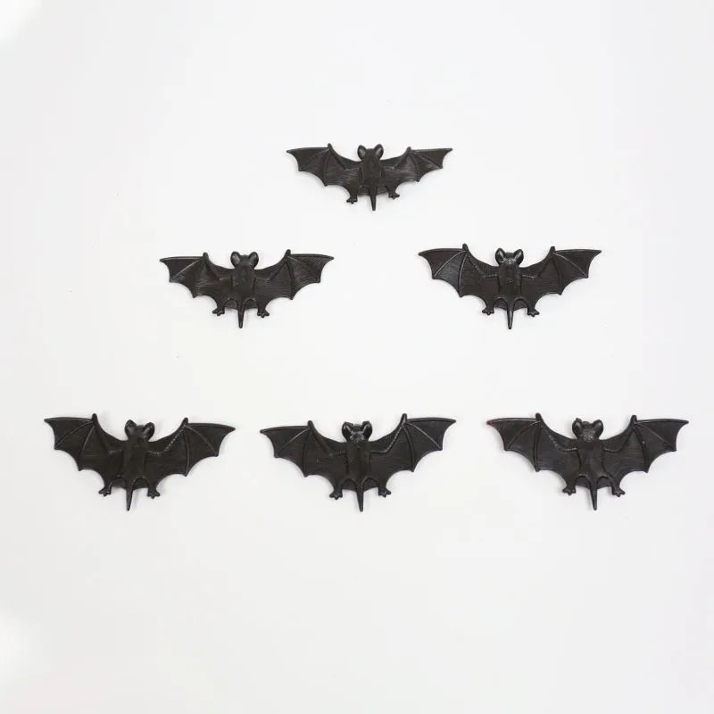 Set of black bat-shaped decorations on a white background halloween decor cute bats spooky