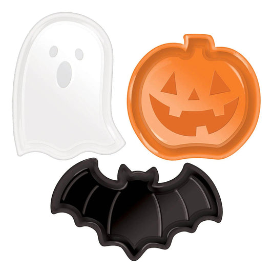 Halloween-themed snack appetizer plates shaped like a ghost, pumpkin, and bat on a white background.